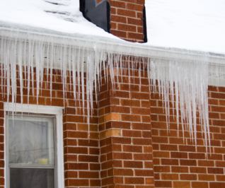 Ice Dam Prevention and Removal: Protecting Your Roof from Winter Damage