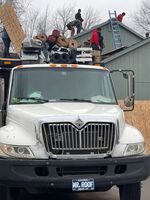 roofers and white truck