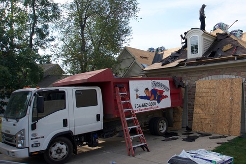 Roofman USA helping local Ann Arbor resident with storm damage repairs
