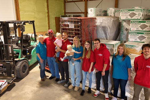 The Roofman team in the Roofman USA Saline warehouse